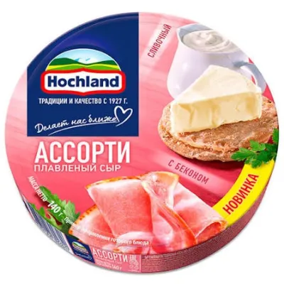 Плавленый сыр Hochland ассорти в круглой коробочке весом 140 г