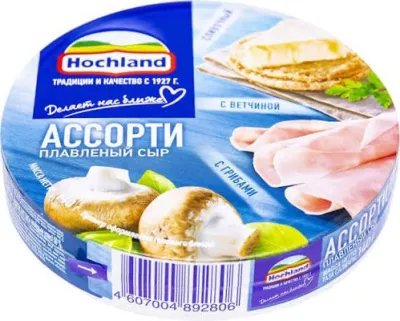 Плавленый сыр Hochland ассорти в круглой коробочке весом 140 г