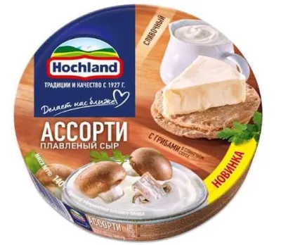 Плавленый сыр Hochland ассорти в круглой коробочке весом 140 г