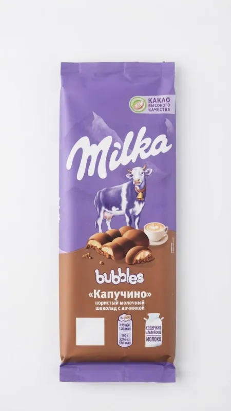 Пористый молочный шоколад Milka Bubbles «Капучино» с начинкой