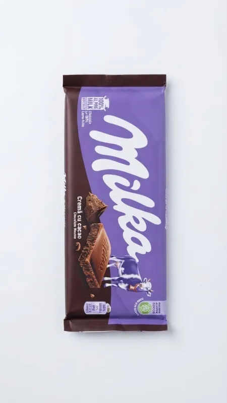 Молочный шоколад Milka с начинкой из какао-мусса (Cremă cu cacao / Chocolate Mousse)