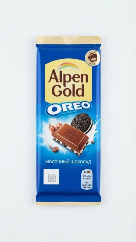 Молочный шоколад Alpen Gold с начинкой со вкусом ванили и кусочками печенья Oreo